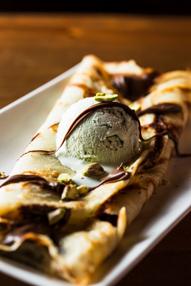 Plate piece pizza scoop ice cream